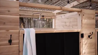 The open-air shower at Orca Camp
