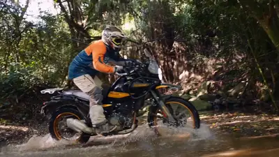 Crossing a jungle stream on a Himalayan 450