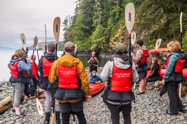 Guide briefing guests on the beach before launching