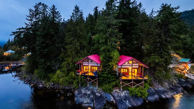 Waterfront chalets at dusk, Moutcha Bay Resort