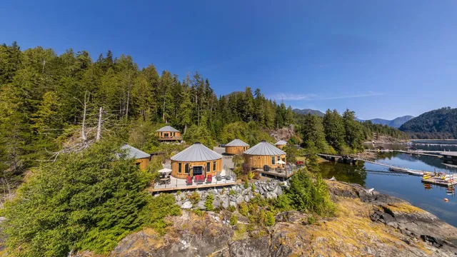 The cedar yurt village above the water at Moutcha Bay
