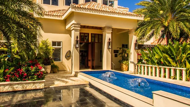The entrance and arrival fountain at Quintessence Hotel